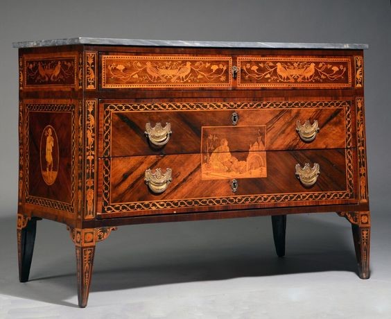 A Vintage Chest With 4 Drawers And It's Antique Designs Makes it Valuable